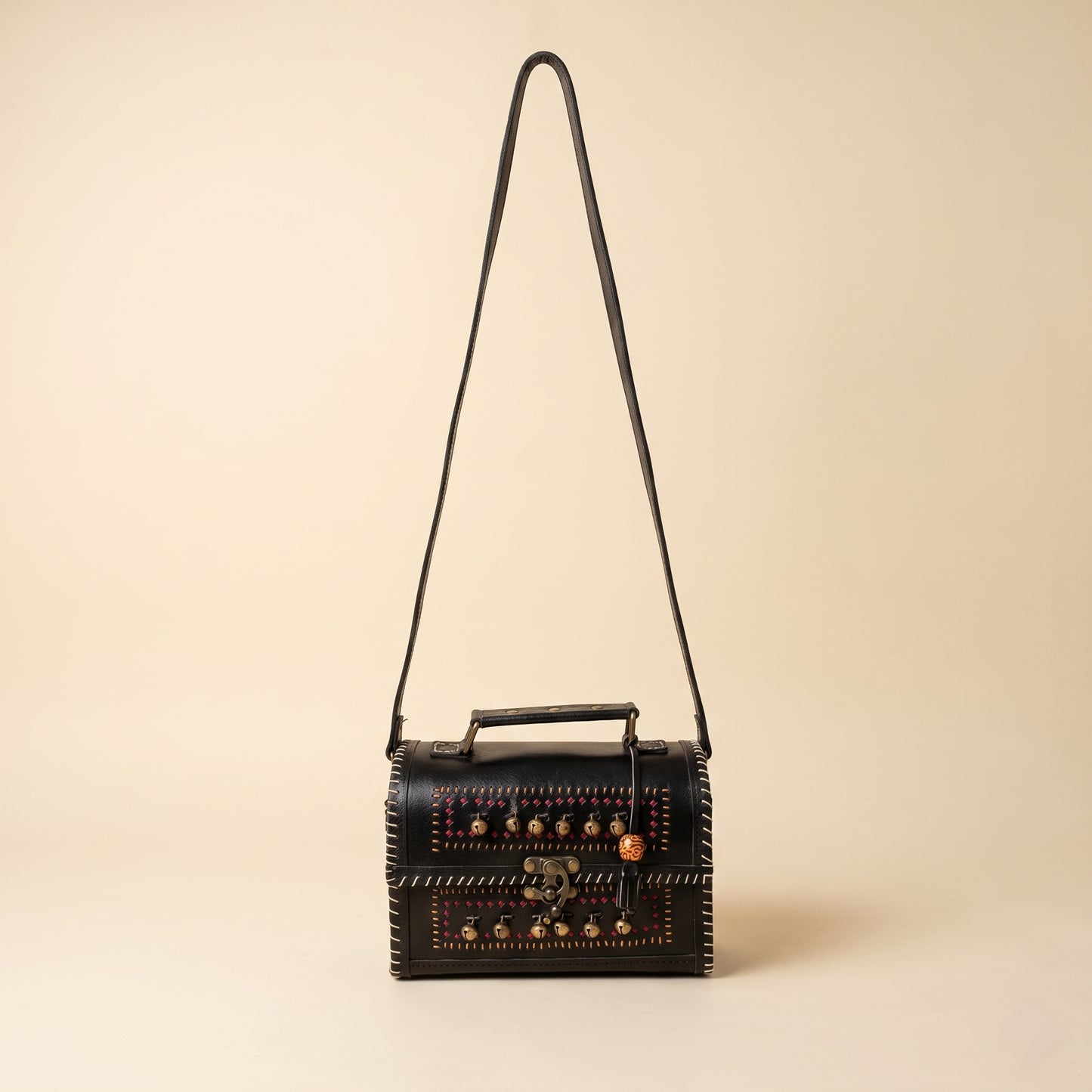 Handcrafted Black Leather Bag Ghunghroo With Yellow & Red Punch (19CM) SKU - CAC-LB-GYR-1