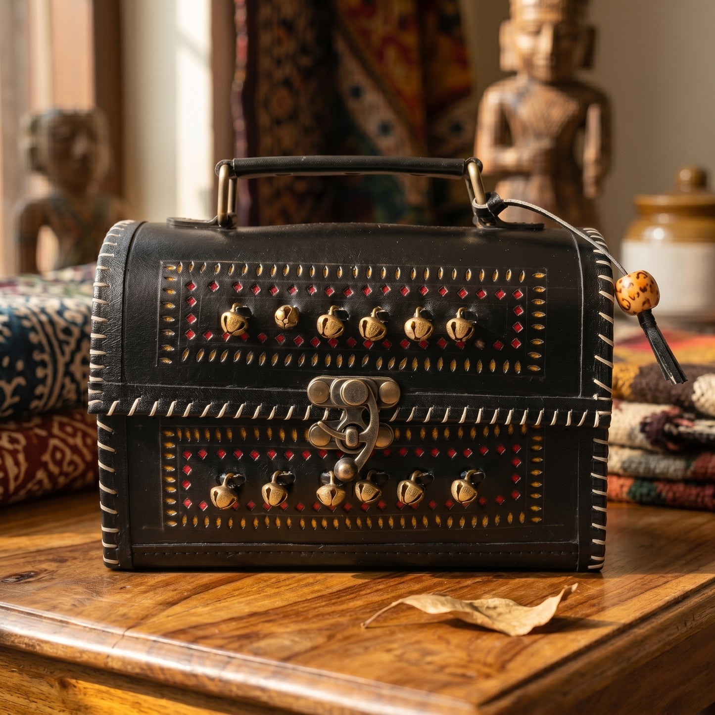 Handcrafted Black Leather Bag Ghunghroo With Yellow & Red Punch (19CM) SKU - CAC-LB-GYR-1